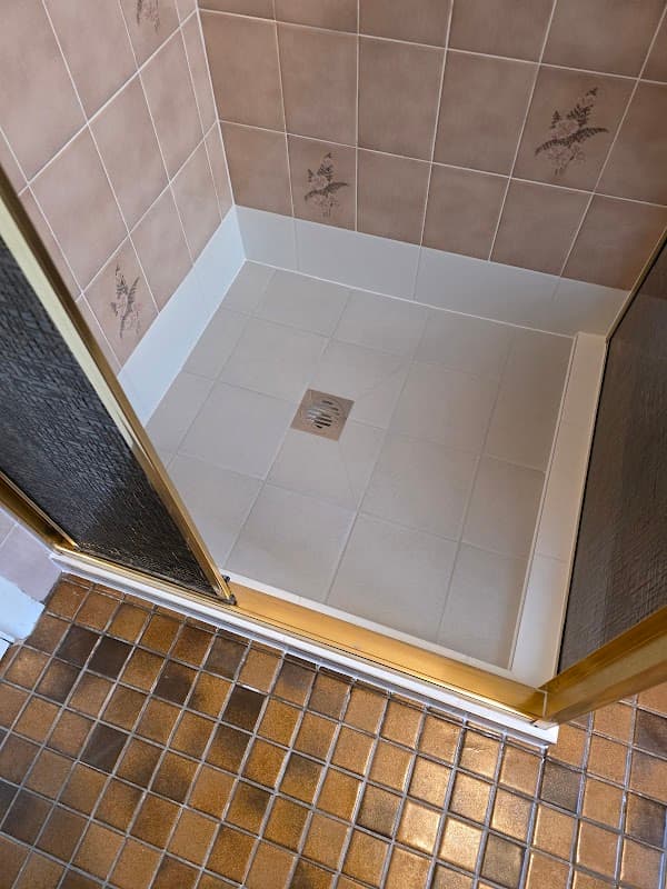 Moon tile pty ltd 322989c leaking shower and balcony, tiling and bathroom renovation cover