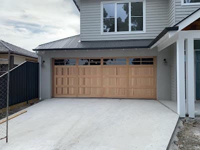 T Mcknight Garage Doors cover
